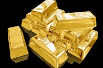 纸黄金与黄金ETF的交易规则有何不同？