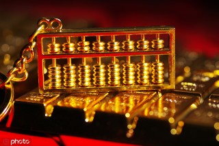 黄金价格在经济过热期走势？